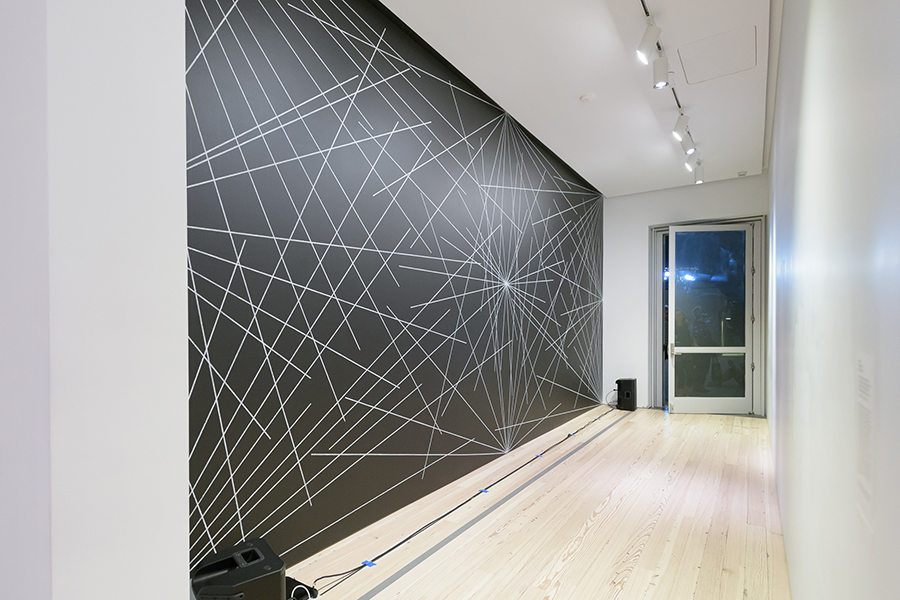SETH CLUETT ON 4TH WALL: 24 LINES FROM THE CENTER, 12 LINES FROM THE MIDPOINT OF EACH OF THE SIDES, 12 LINES FROM EACH CORNER BY SOL LEWITT